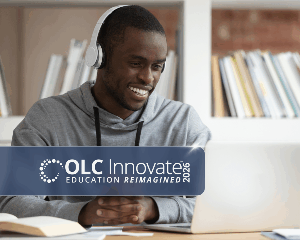 A photo of a man wearing headphones writing in front of his laptop in a bright and airy office space with the OLC Innovate logo overlaid on top.