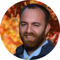 Circular cutout of Reed Hepler's headshot
